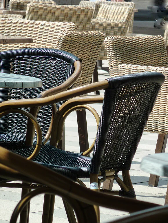 a close up photo of restaurant chairs